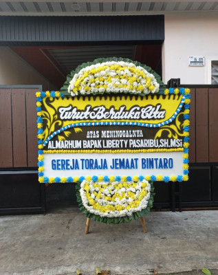 Papan Bunga Duka di Birobuli Selatan